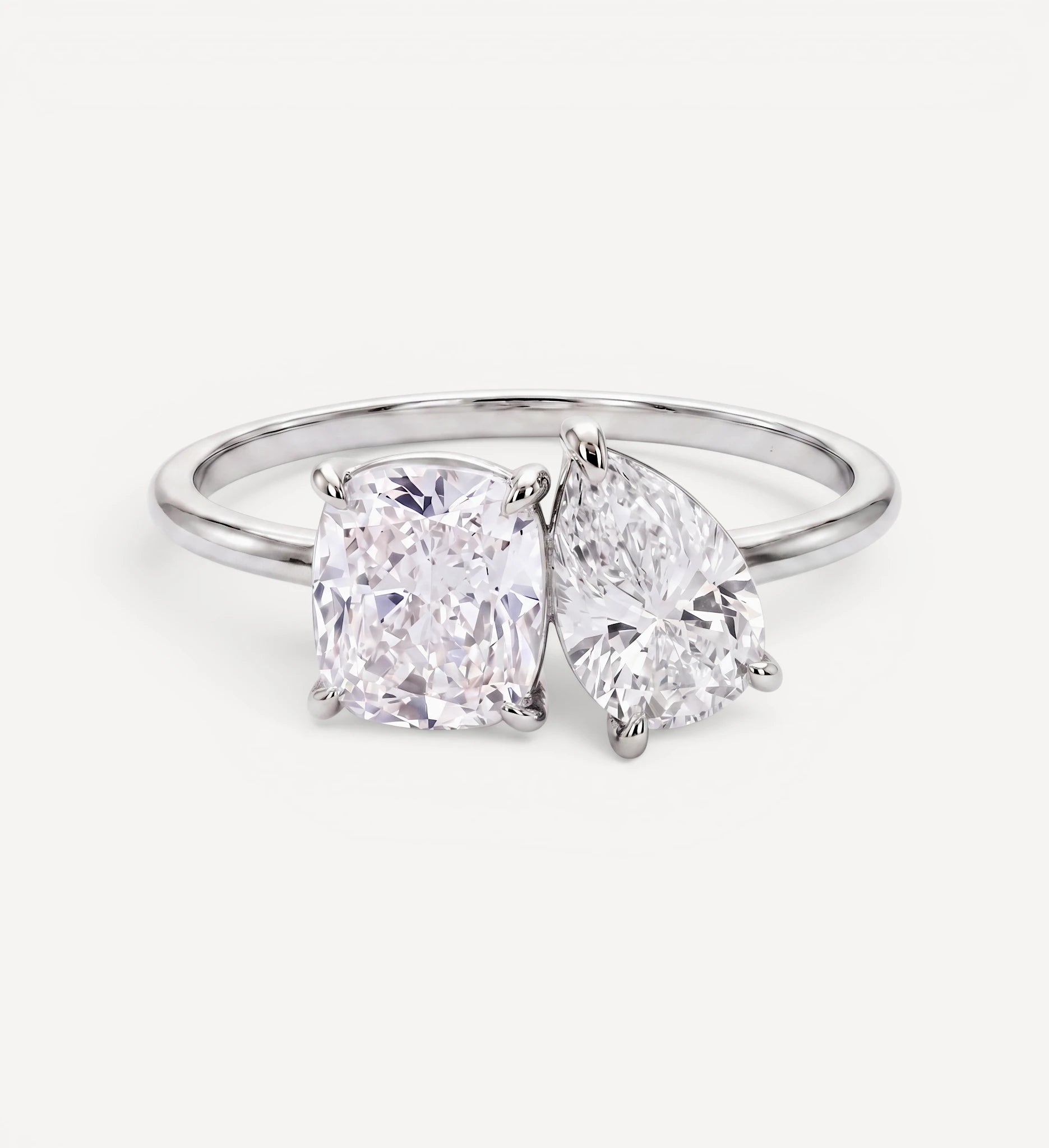 Toi et Moi | cushion & pear diamond