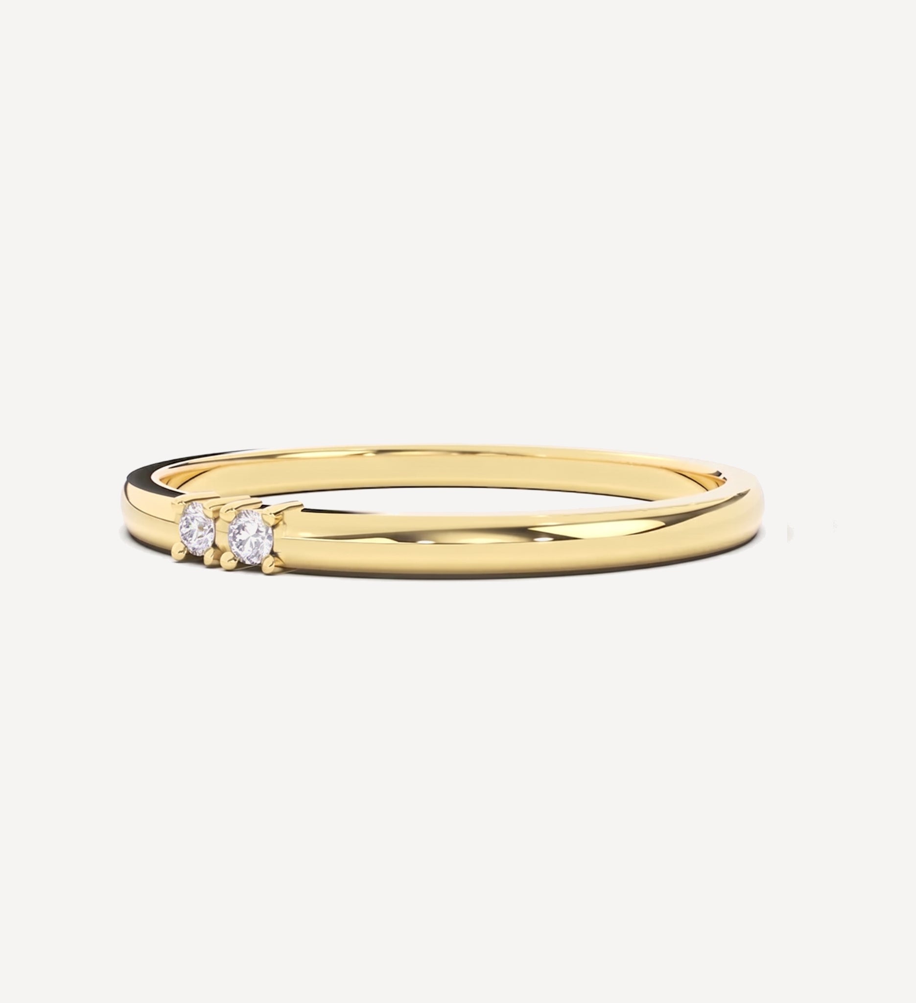 Engraved Morse code diamond ring in polished yellow gold featuring personalised Morse code engraving and two round white diamonds set side-by-side on a slim gold band