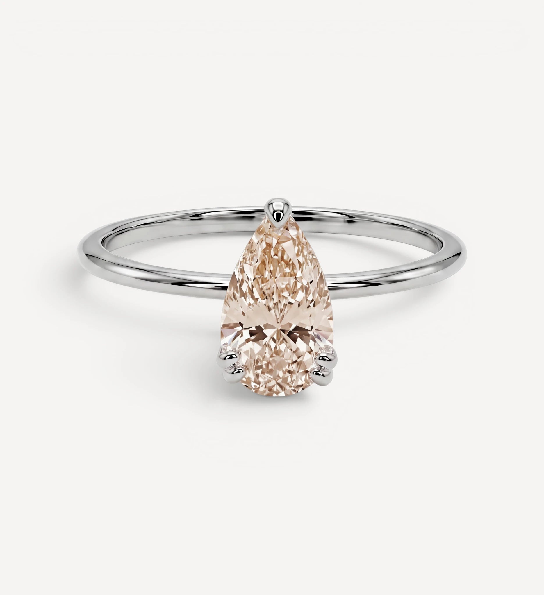 Pear Solitaire | champagne diamond