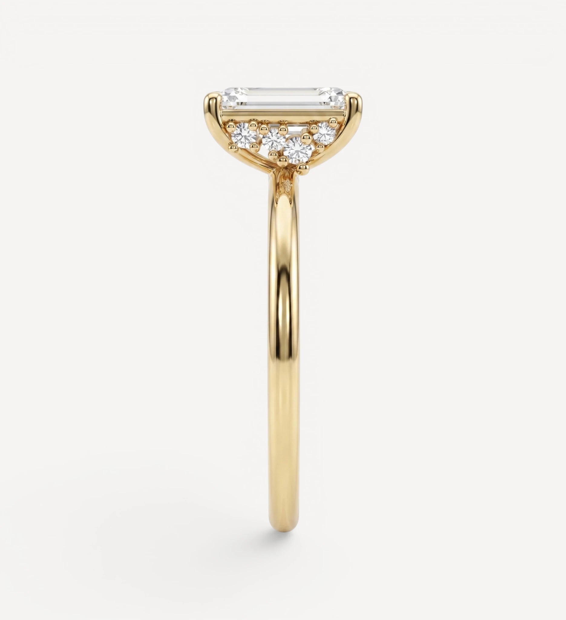 Flora ring | emerald diamond halo