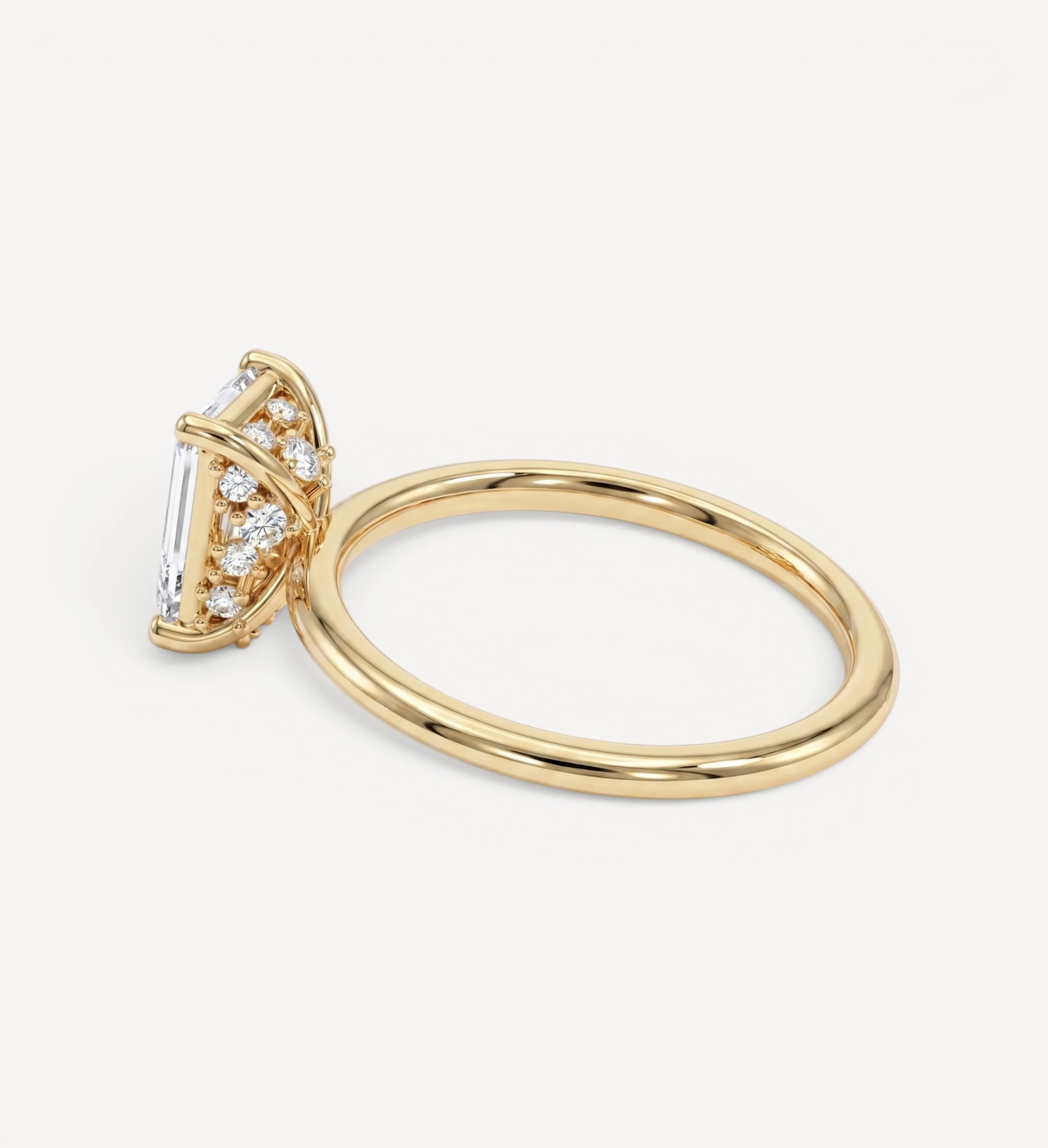 Flora ring | emerald diamond halo
