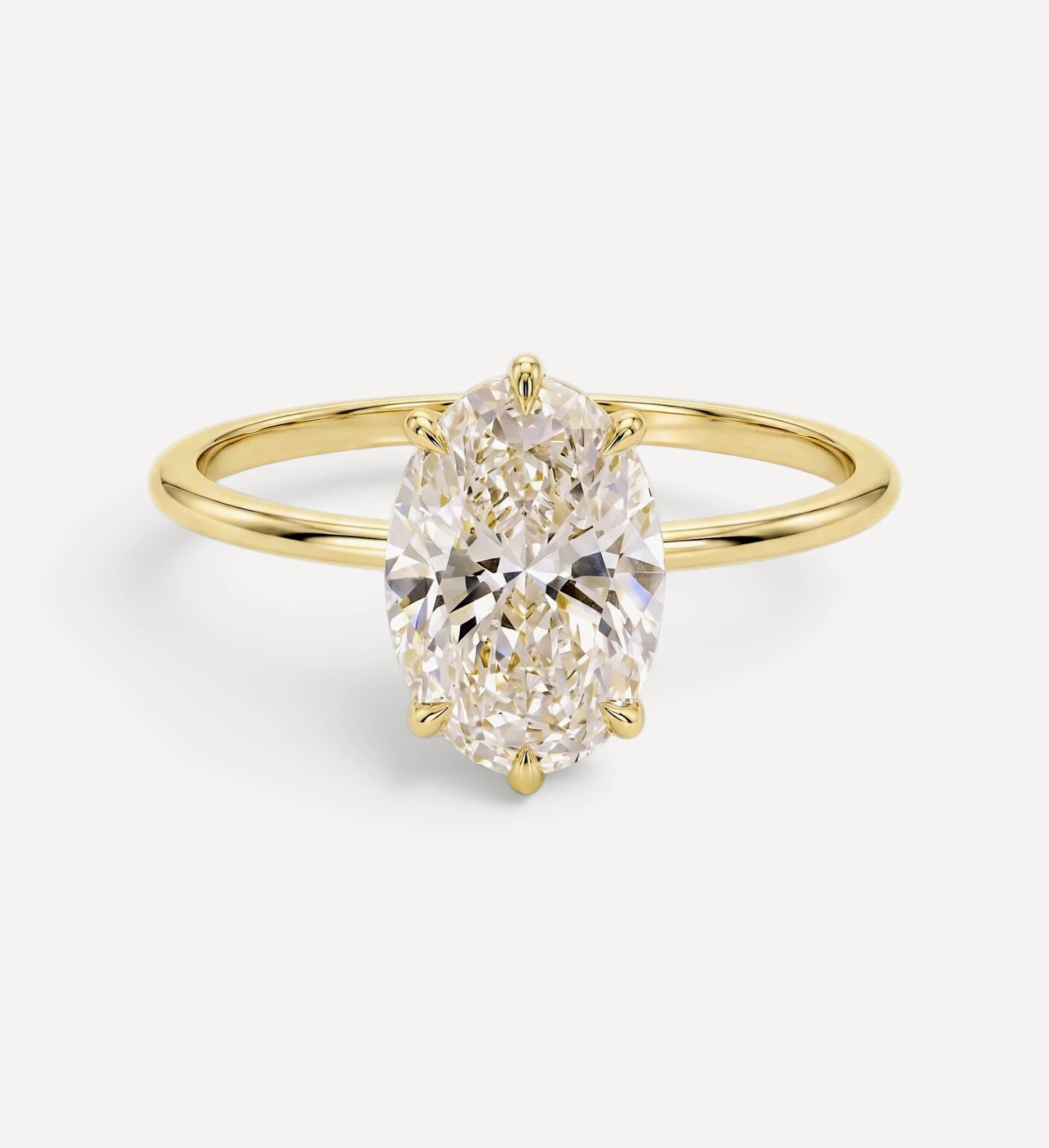 Flora ring | oval diamond halo