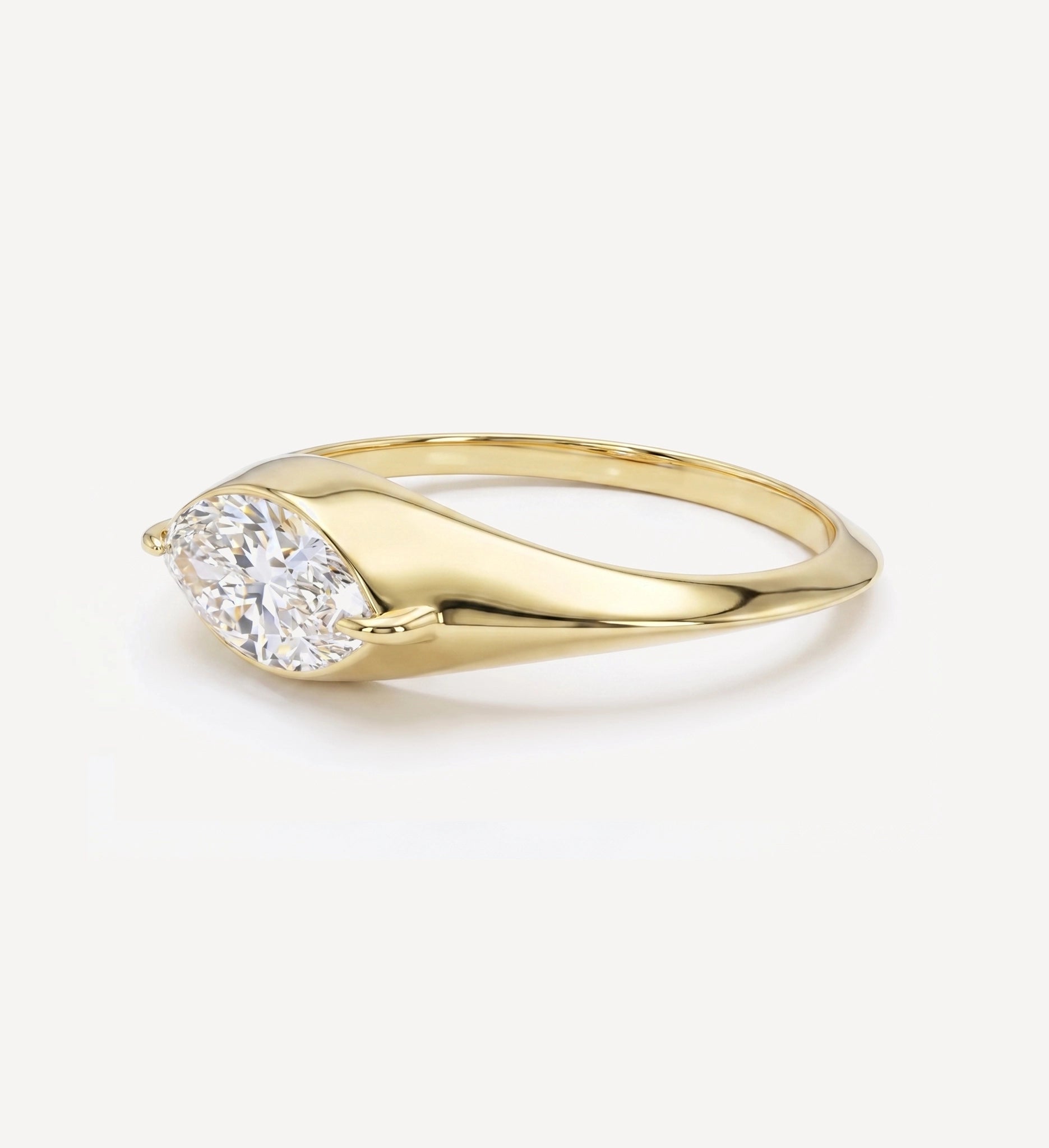 Large 0.50ct marquise diamond solid gold signet ring in yellow gold with a marquise-cut diamond