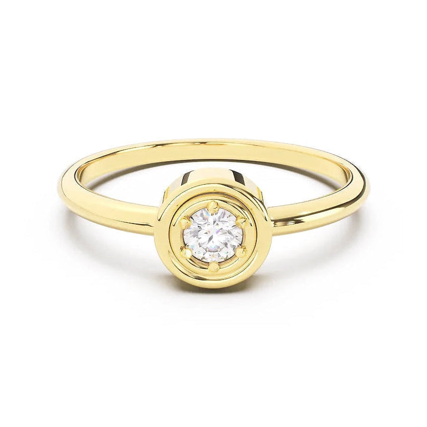 Gold ring with a diamond on a white background