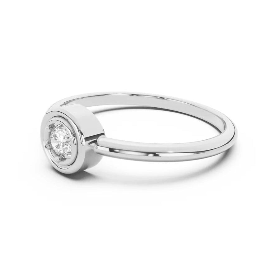 Silver ring with a diamond on a white background