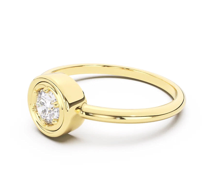 Gold ring with a diamond on a white background