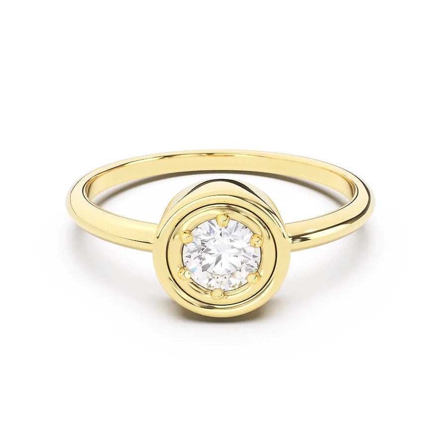 Gold ring with a diamond on a white background