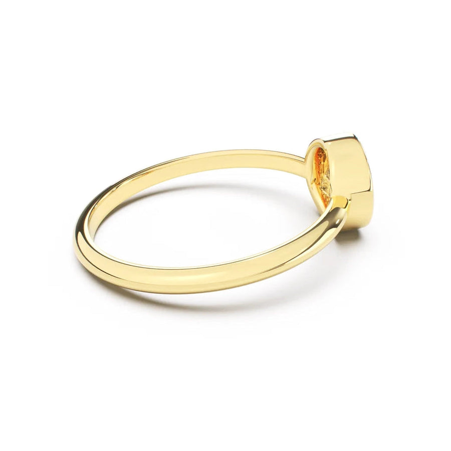 Gold ring on a white background