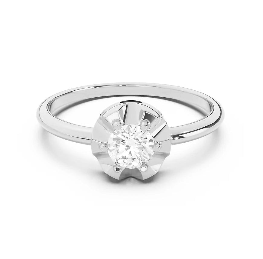 Silver scallop ring with a diamond on a white background