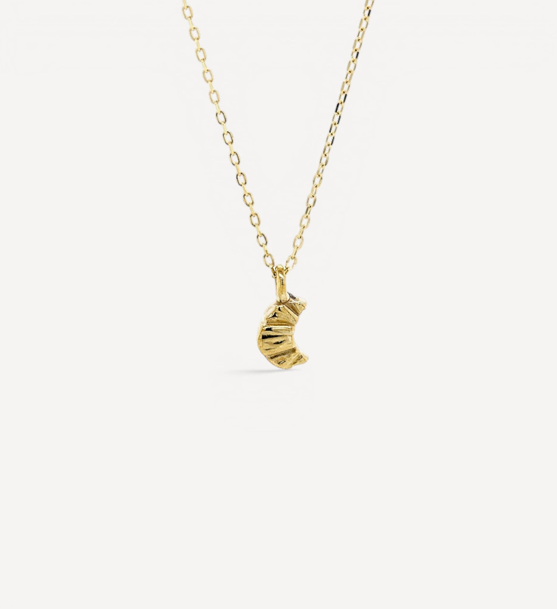 Croissant charm necklace