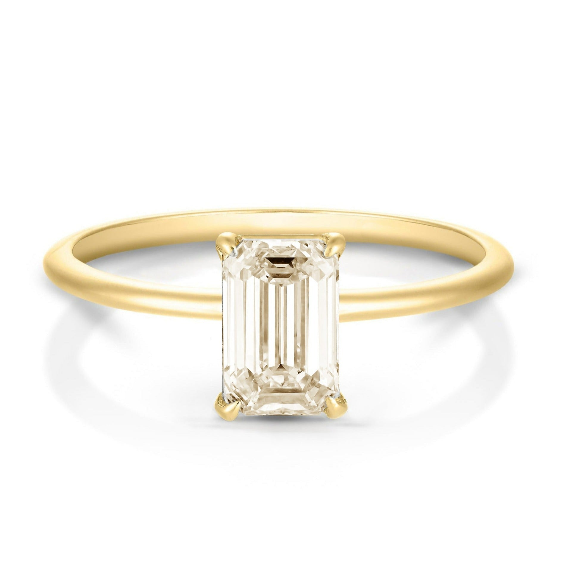 Flora ring | emerald diamond halo