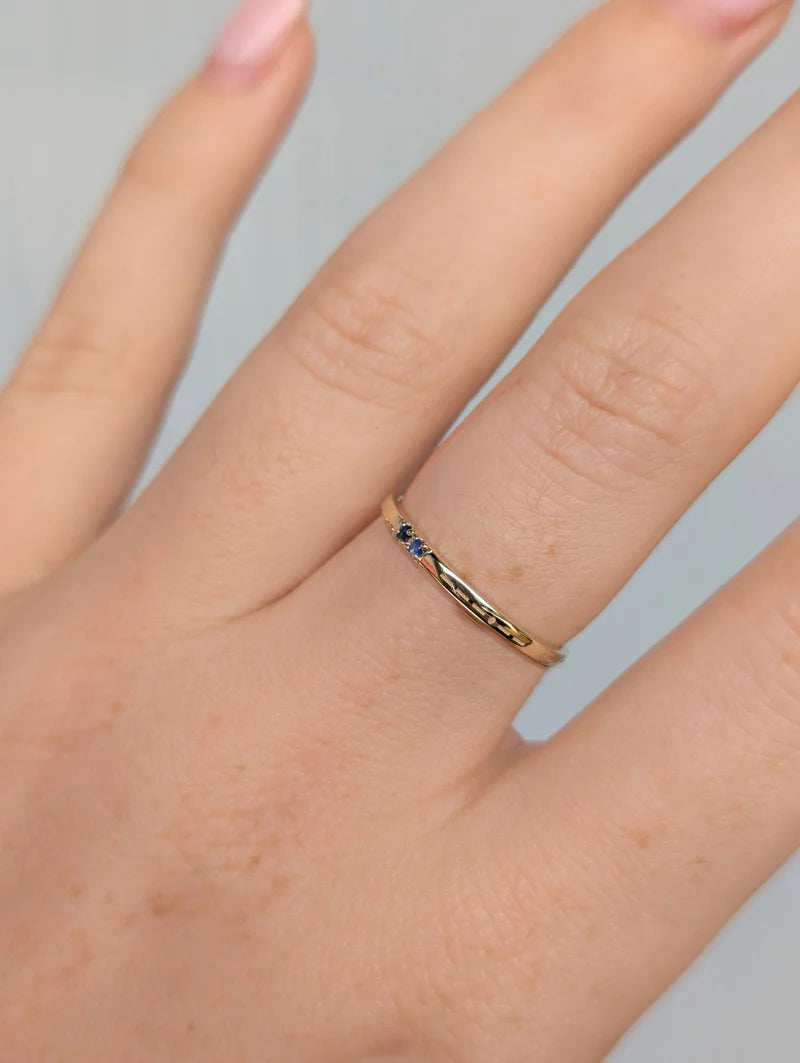 Engraved Morse code diamond ring in polished yellow gold featuring personalised Morse code engraving and two round white diamonds set side-by-side on a slim gold band 