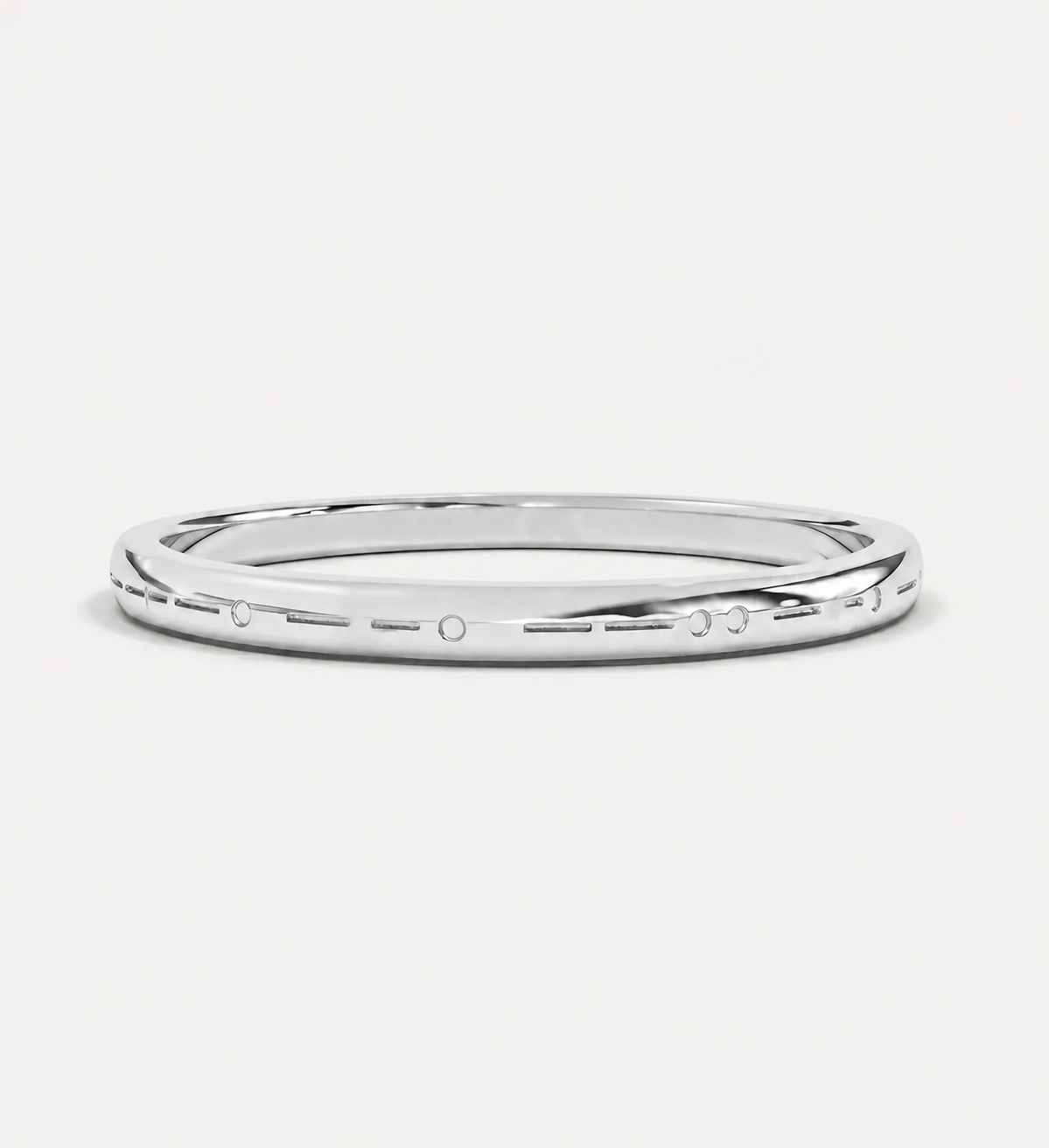Plain engraved custom Morse code ring in polished yellow gold featuring personalised dot and dash engraving around the band