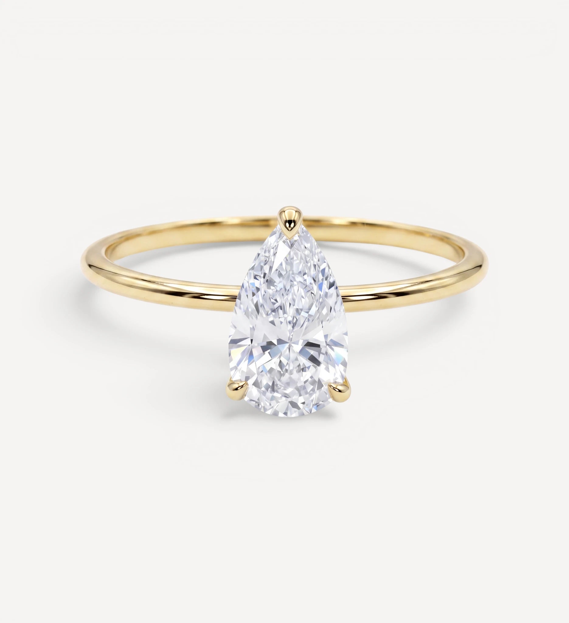 Flora ring | pear diamond halo