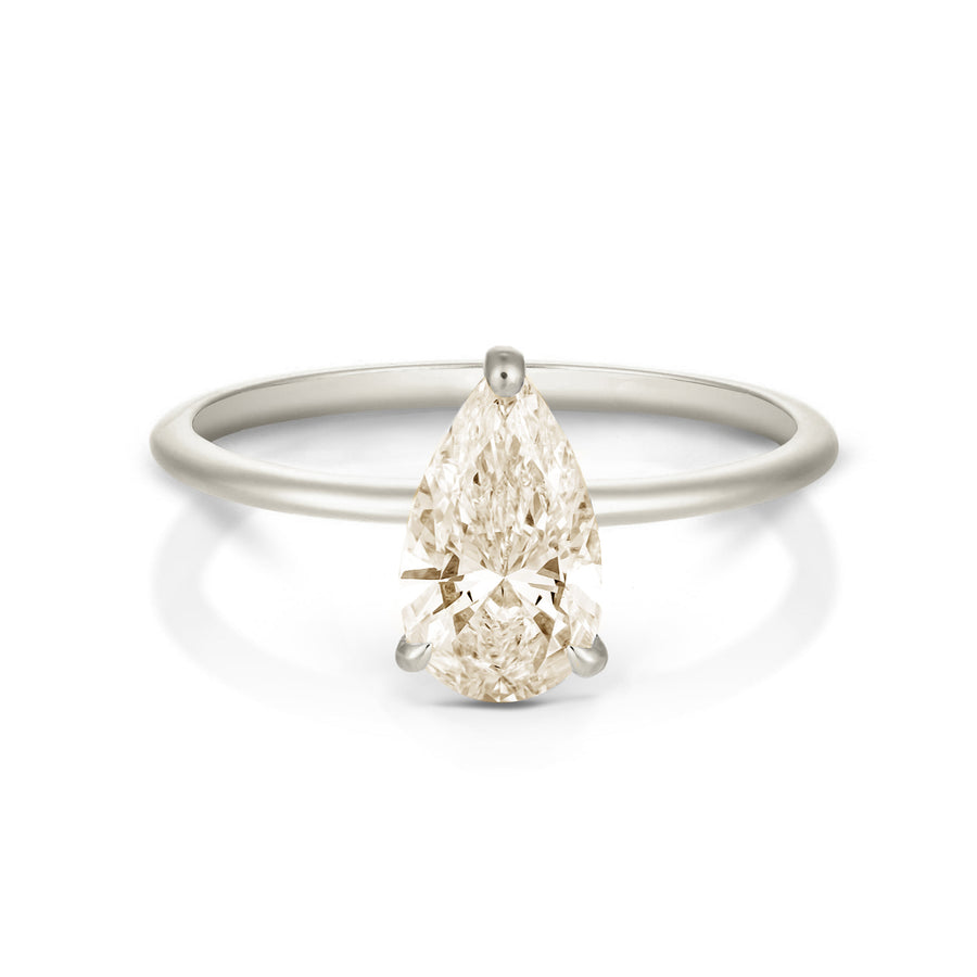 Flora ring | pear diamond halo