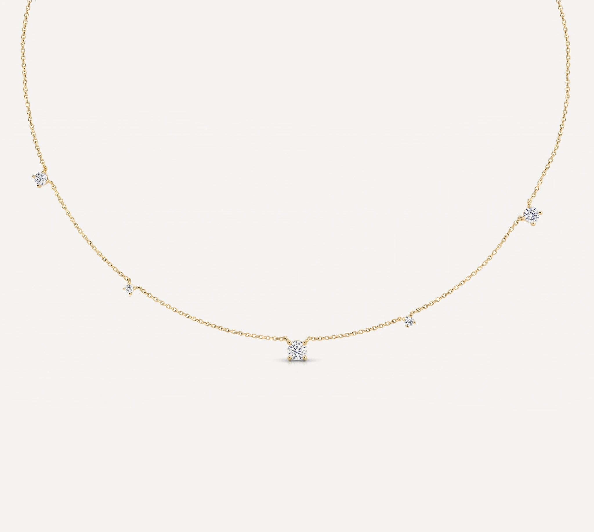 Celeste diamond satellite necklace in gold with five round diamonds on a delicate chain by HLSK Jewellery