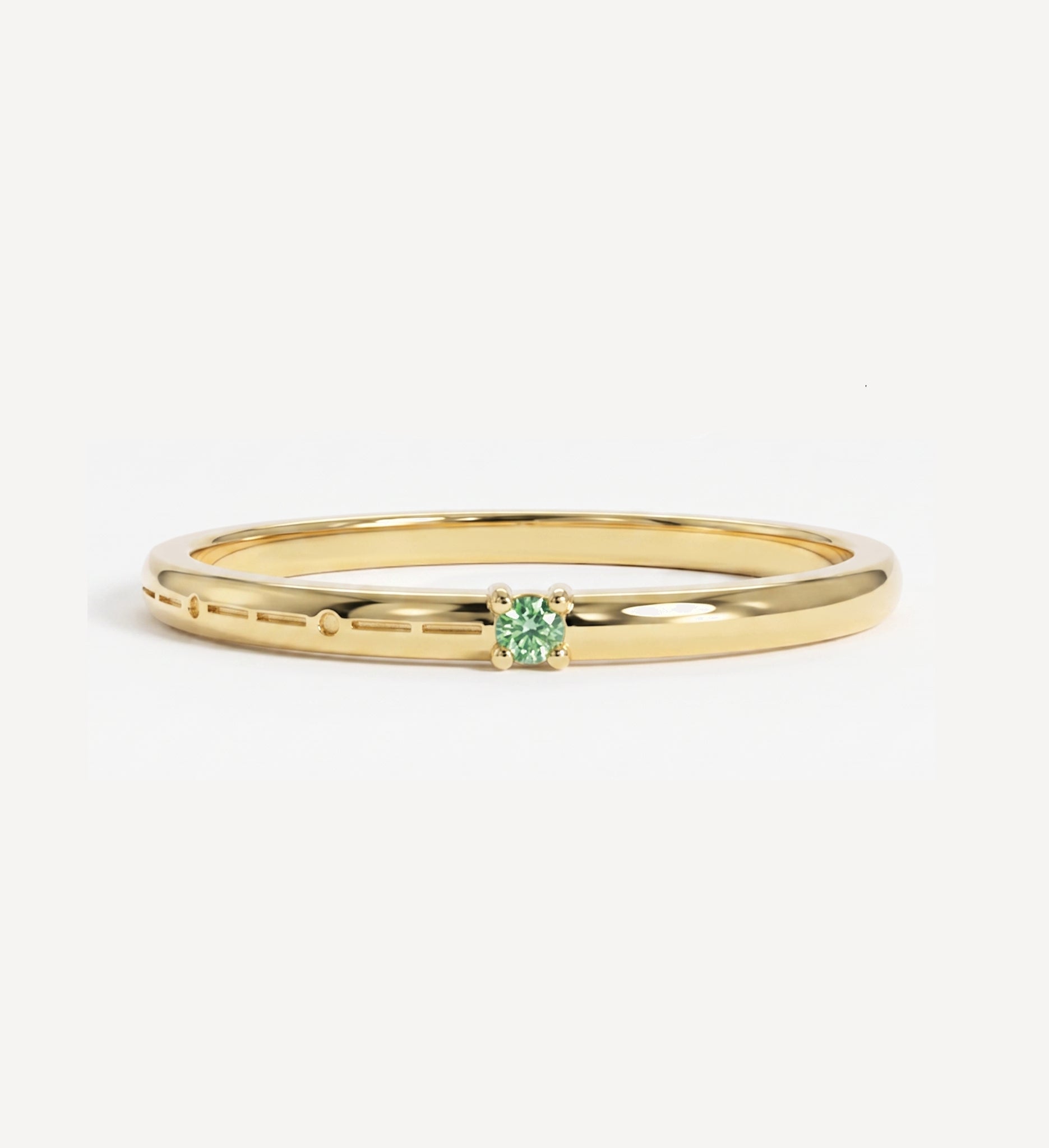 Custom engraved Morse code single birthstone ring in polished yellow gold with a pink birthstone and personalised Morse code engraving