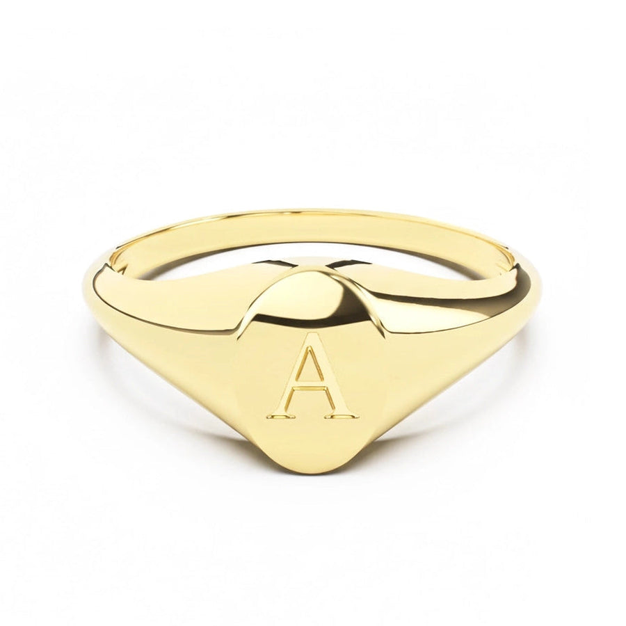 Gold ring with an engraved letter 'A' on a white background
