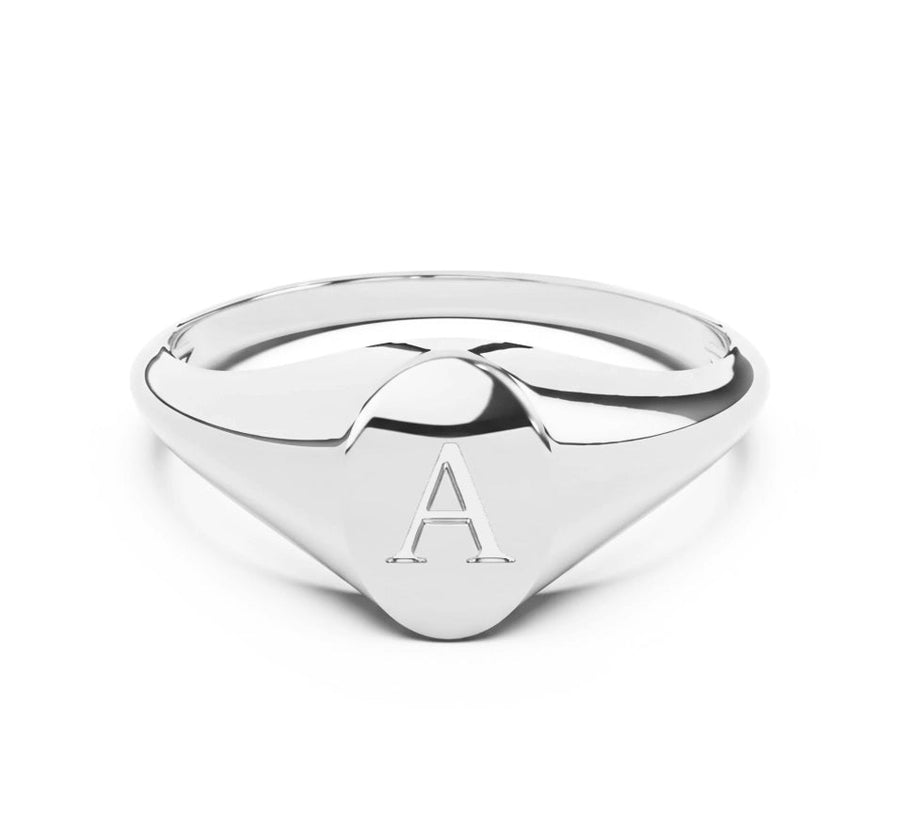 Silver signet ring with a  engraved letter 'A' on a white background