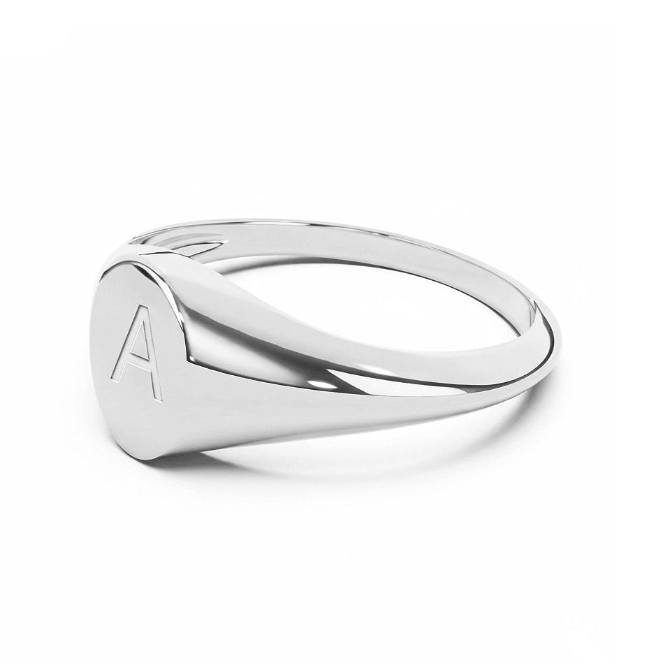 Silver signet ring with a engraved letter 'A' on a white background