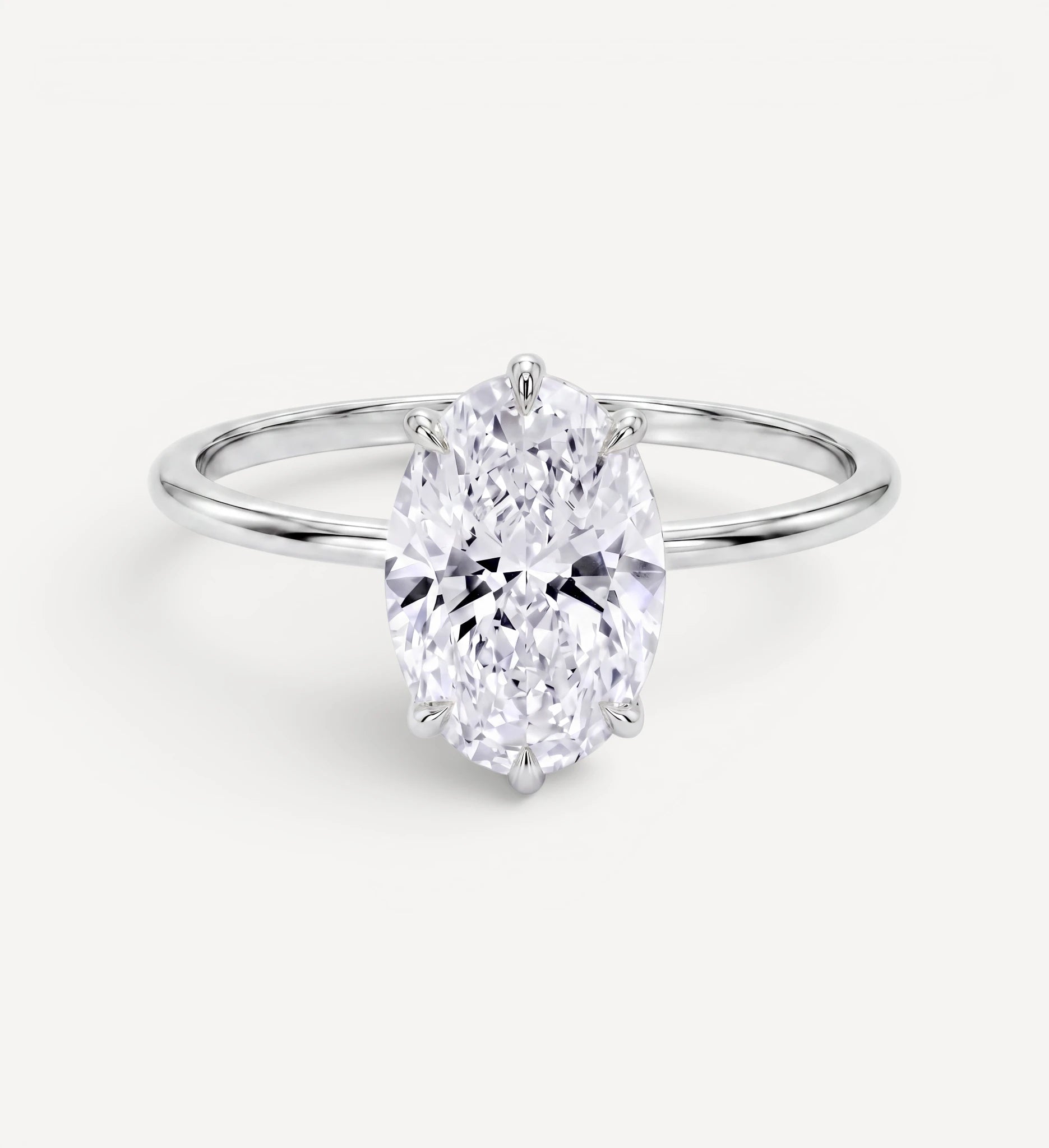 Flora ring | oval diamond halo