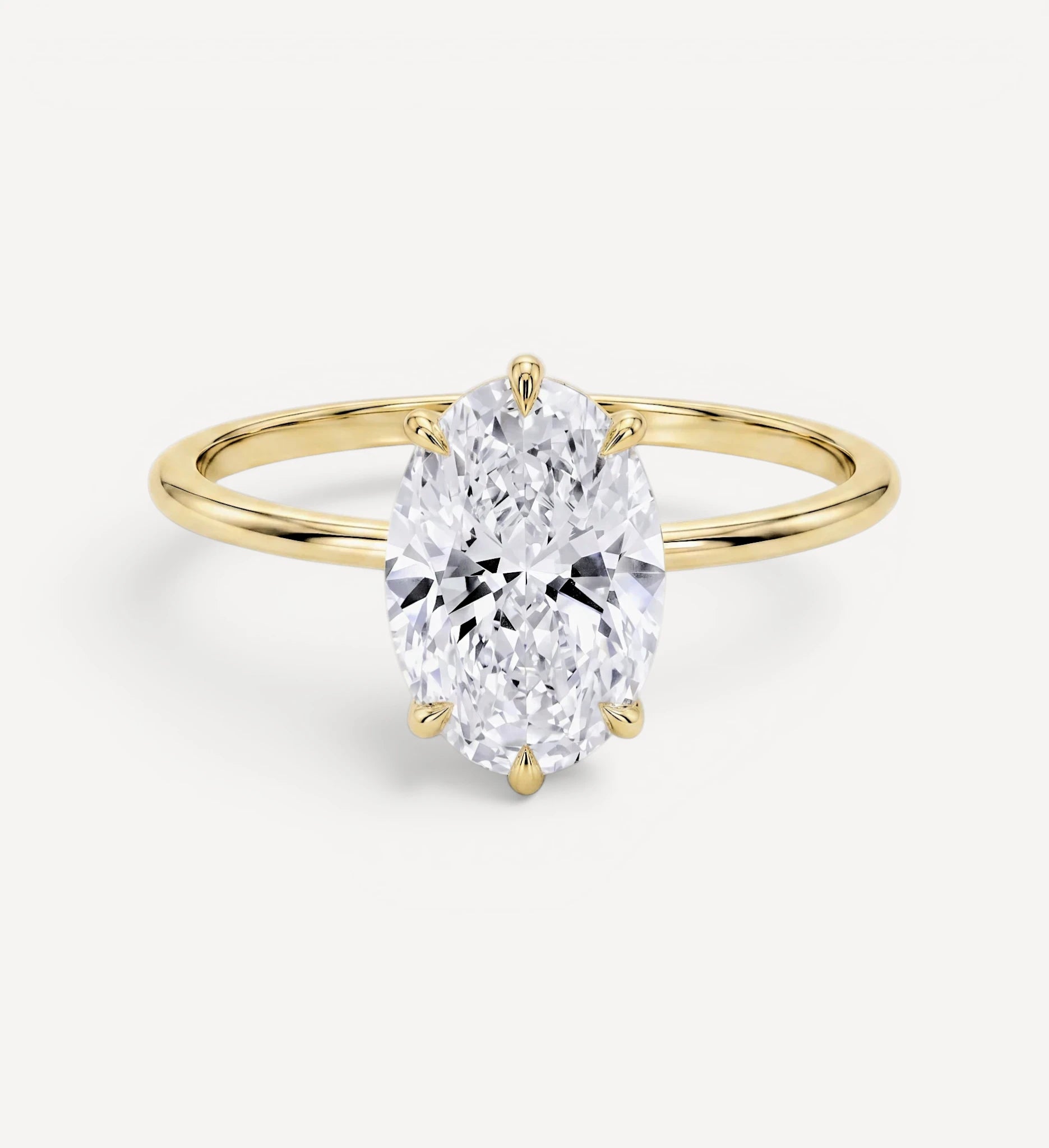 Flora ring | oval diamond halo