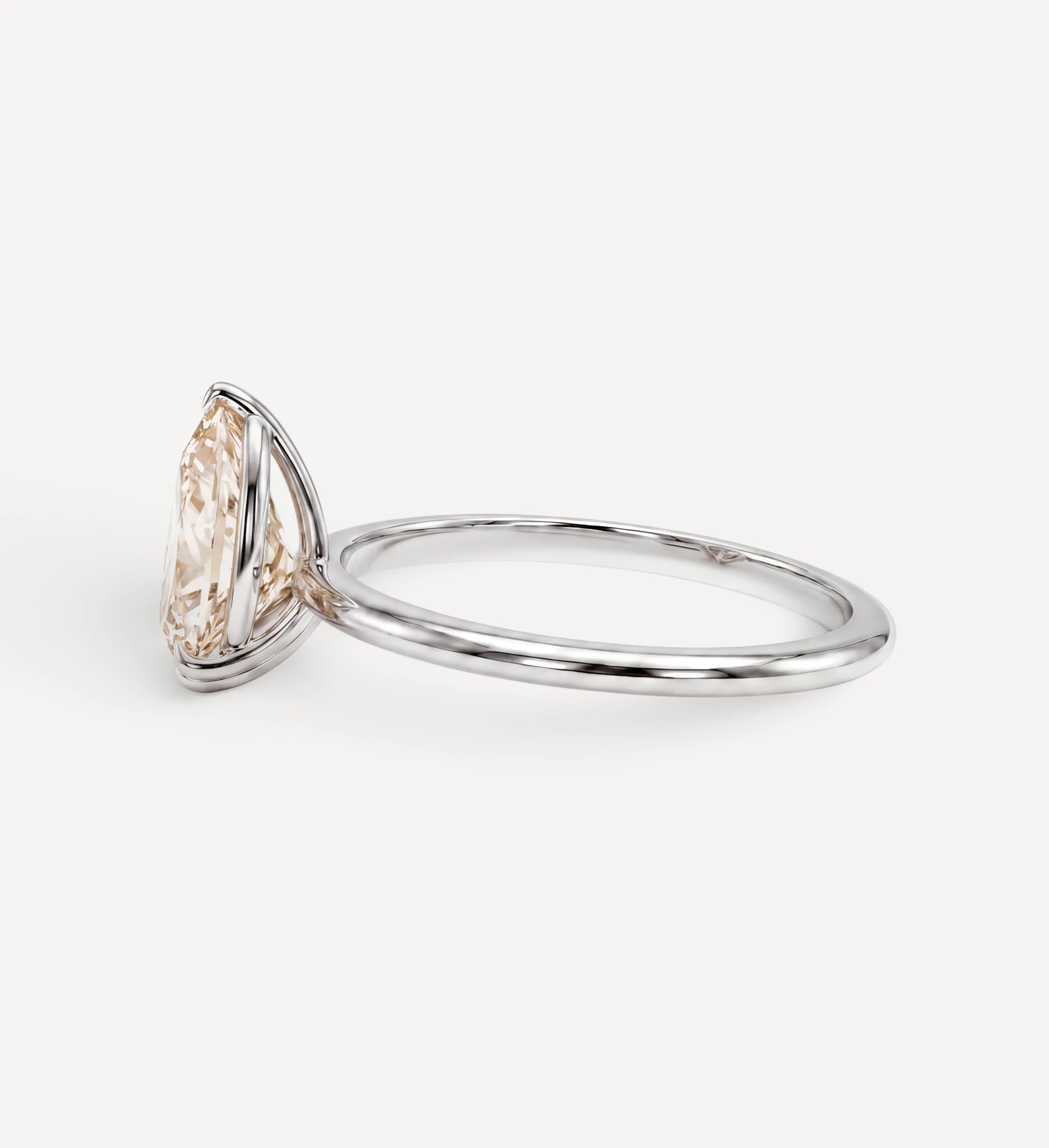 Pear Solitaire | champagne diamond