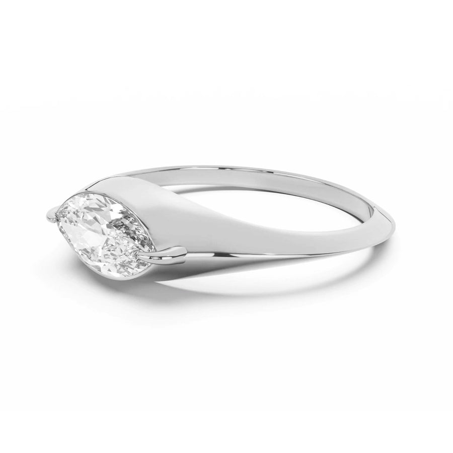 Silver Signet ring with a Marquise diamond on a white background