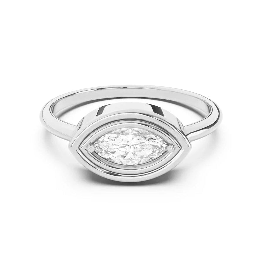 Silver ring with a diamond on a white background