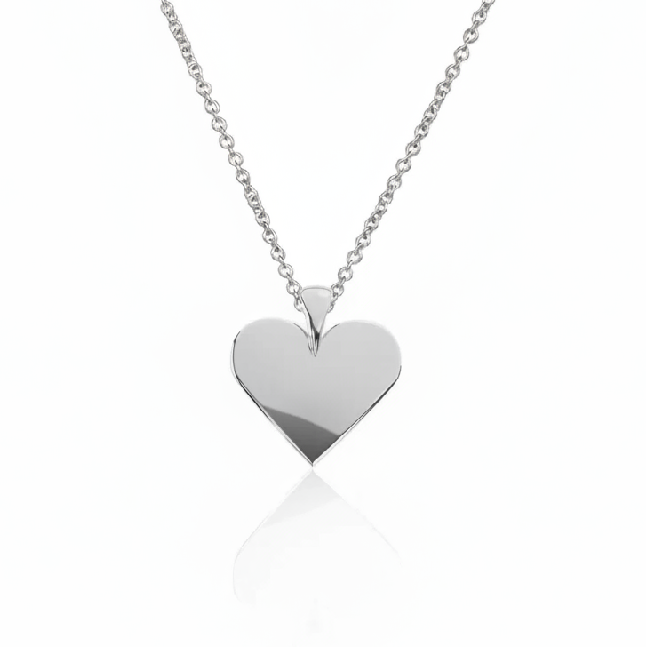 Silver heart-shaped pendant on a chain against a white background