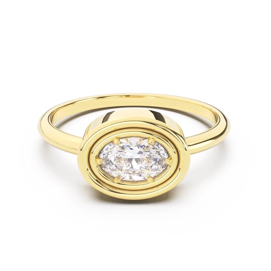 Gold ring with a diamond on a white background