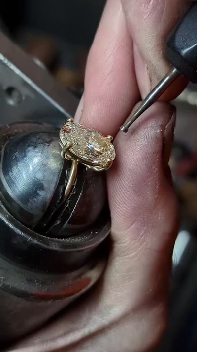 HLSK jewellery handcrafting fine jewellery in Melbourne workshop using traditional goldsmithing techniques with champagne diamonds